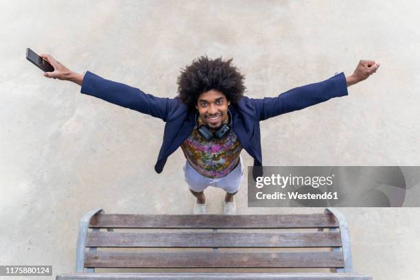 portrait of happy stylish man - elevated view portrait stock pictures, royalty-free photos & images