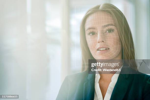 facial recognition, businesswoman with grid over her face - faces grid stock pictures, royalty-free photos & images