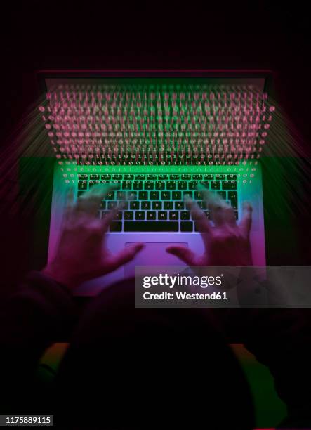 cyber crime, a hacker using a virus to attack software - virus informatico foto e immagini stock