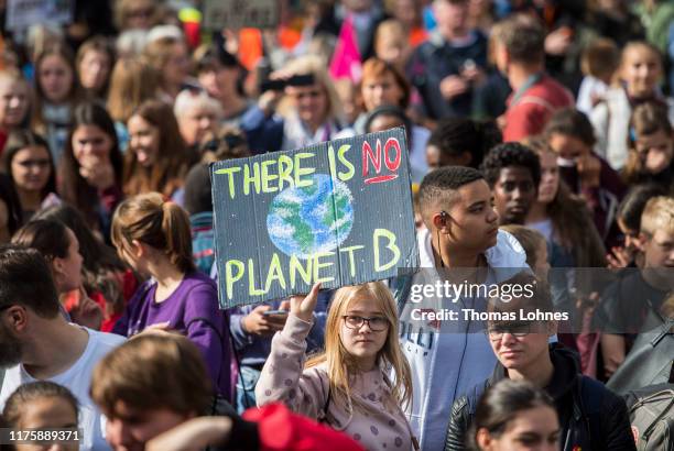 Participants in the Fridays For Future movement protest during a nationwide climate change action day in on September 20, 2019 in Frankfurt, Germany....