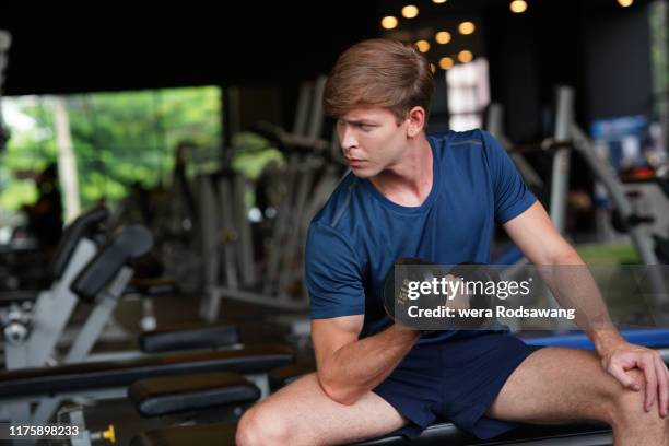 Male Models Routine Healthy Male Doing Routine Exercise At Gym High-Res Stock Photo - Getty ...