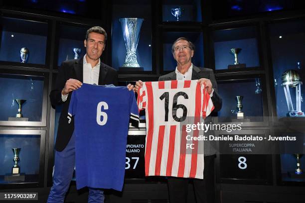 Luiz Carlos Herrero gives to Riccardo Scirea, Gaetano's son, a jersey received from Gaetano Scirea during the 1977 match between Atletico Bilbao and...