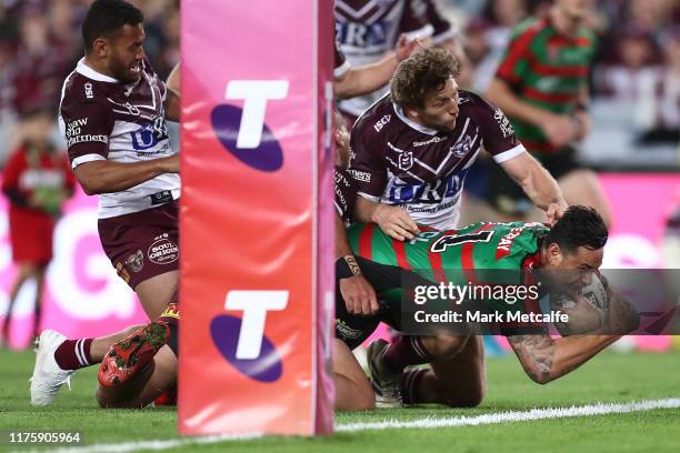 John Sutton of the Rabbitohs scores a try during the NRL Semi Final match between the South Sydney Rabbitohs and the Manly Sea Eagles at ANZ Stadium...