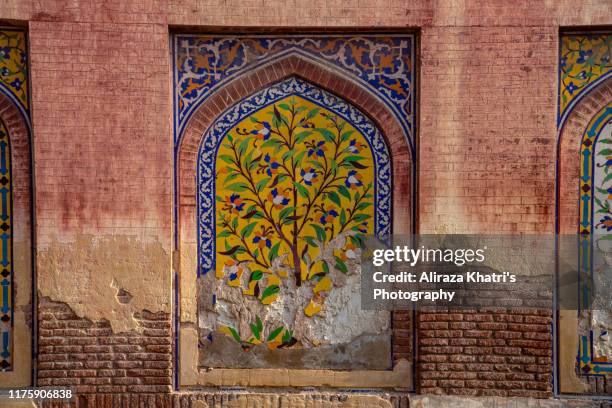 fresco tile decor details on wazir khan mosque - pakistan - punjabi decor stock pictures, royalty-free photos & images