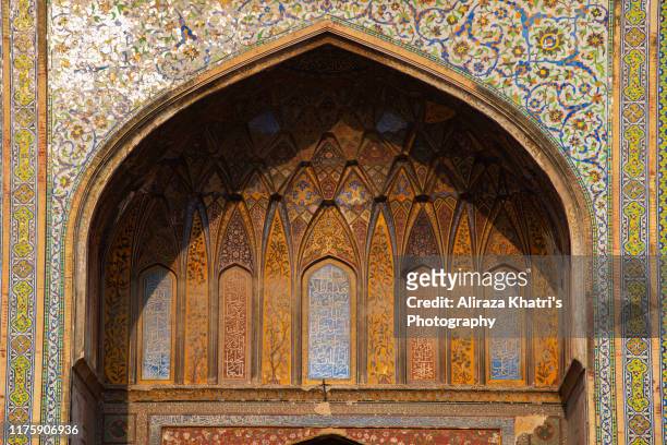 fresco tile decor on wazir khan mosque - pakistan - punjabi decor stock pictures, royalty-free photos & images