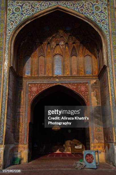 fresco tile decor details on wazir khan mosque - pakistan - punjabi decor stock pictures, royalty-free photos & images