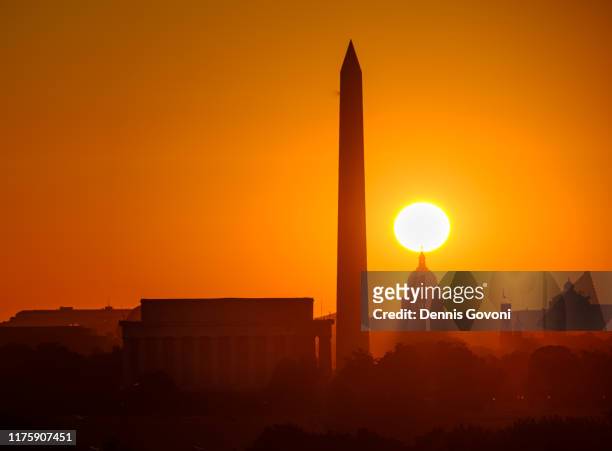 sun atop the capitol - washington dc sunrise stock pictures, royalty-free photos & images
