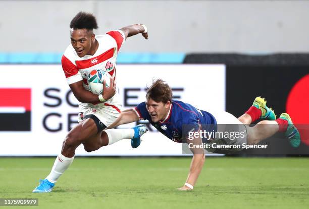 Kotaro Matsushima of Japan makes a break to score his side's fourth try during the Rugby World Cup 2019 Group A game between Japan and Russia at the...