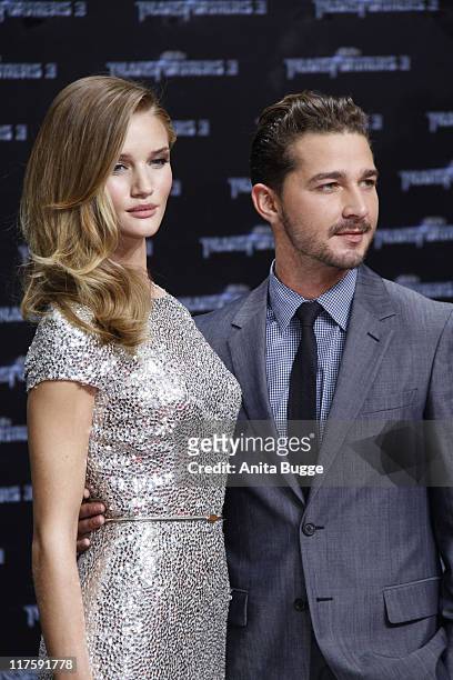 Actress Rosie Huntington-Whiteley and actor Shia LaBoeuf attend the "Transformers 3" Germany premiere at the Cinestar movie theater on June 25, 2011...