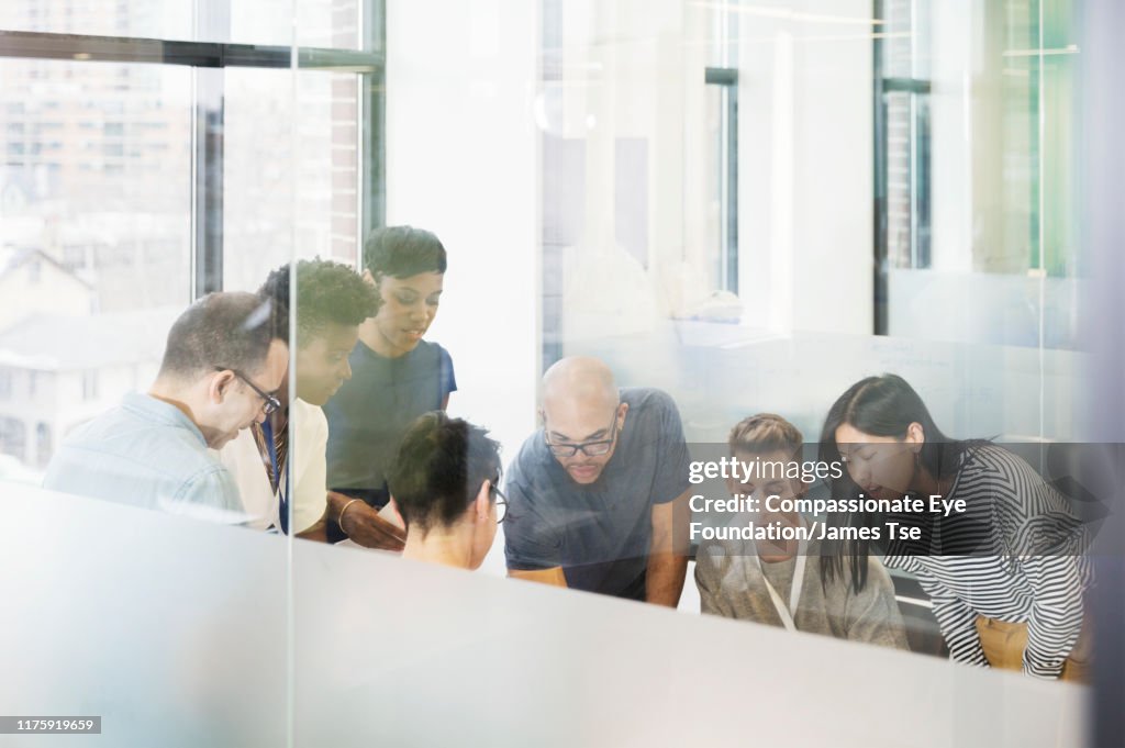 Co-workers brainstorming in modern office