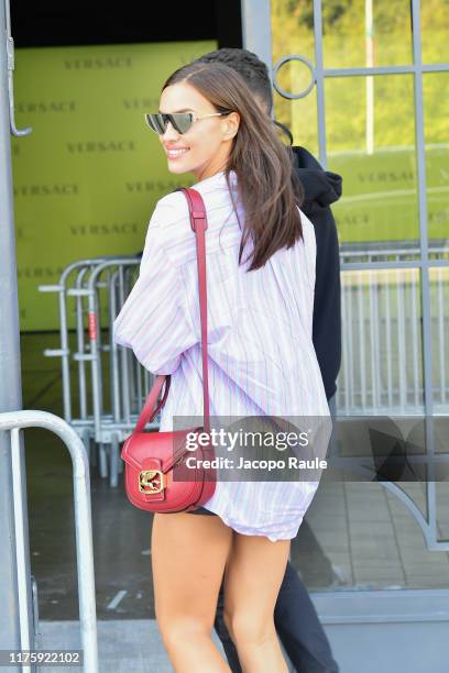 Irina Shayk arrives before Versace show during the Milan Fashion Week Spring/Summer 2020 on September 20, 2019 in Milan, Italy.