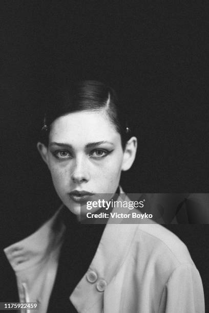 Model prepares backstage for Antonio Marras fashion show during the Milan Fashion Week Spring/Summer 2020 on September 20, 2019 in Milan, Italy.