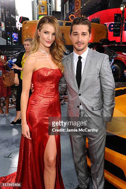 Rosie Huntington-Whiteley and Shia LaBeouf attend the "Transformers: Dark Of The Moon" premiere in Times Square on June 28, 2011 in New York City.