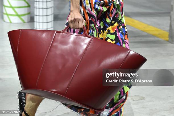 Model, bag detail, walks the runway at the Marni show on on September 20, 2019 in Milan, Italy.