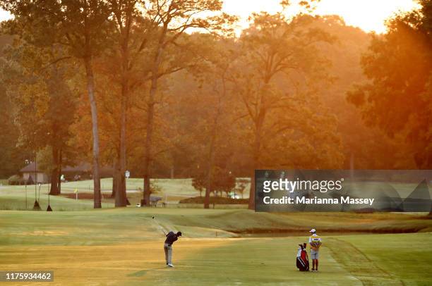 Doc Redman of the United States plays his shot on the 11th hole during a continuation of the first round of the Sanderson Farms Championship at The...