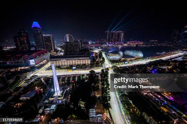 General view showing Alexander Albon of Thailand driving the Aston Martin Red Bull Racing RB15 on track during practice for the F1 Grand Prix of...