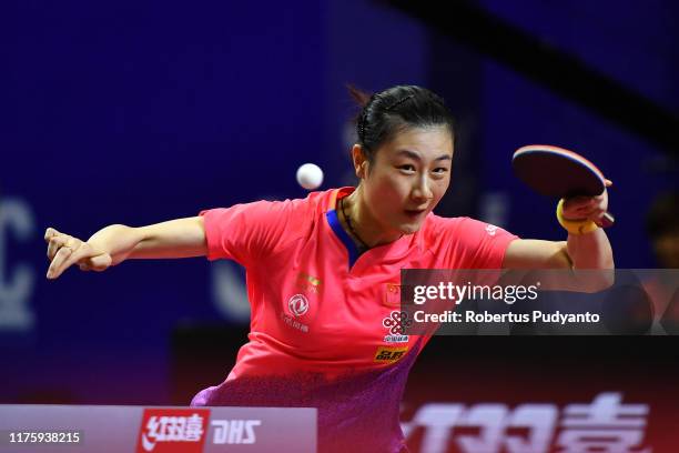 Ding Ning of China competes against Miu Hirano of Japan during Women's Singles quarter-finals match on day six of the ITTF-Asian Table Tennis...