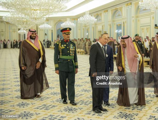 Russian President Vladimir Putin meets with Saudi Arabia's King Salman bin Abdulaziz al-Saud at the Al-Yamamah Palace in Riyadh, Saudi Arabia on...