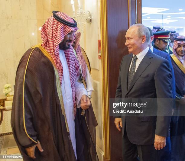 Russian President Vladimir Putin and Saudi Arabia's King Salman bin Abdulaziz al-Saud meet at the Al-Yamamah Palace in Riyadh, Saudi Arabia on...