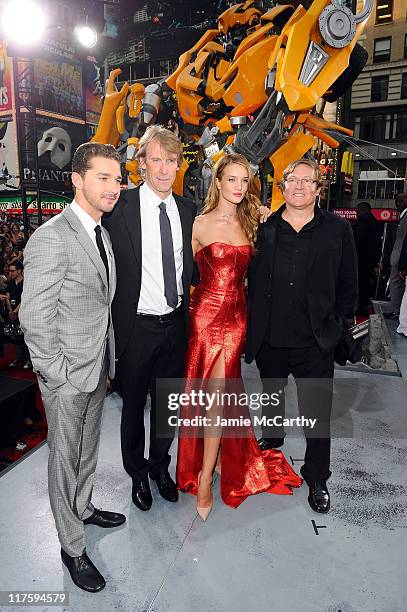 Shia LaBeof, Michael Bay, Rosie Huntington-Whiteley and producer Lorenzo di Bonaventura attend the "Transformers: Dark Of The Moon" premiere in Times...