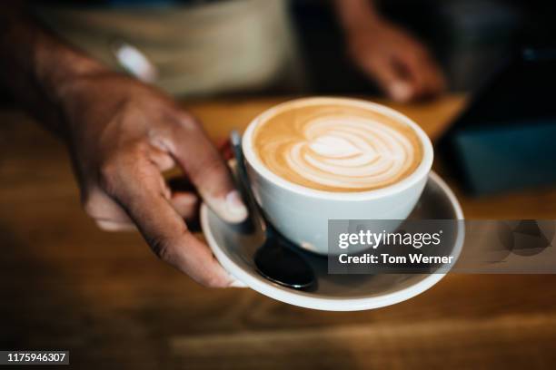 freshly made cup of coffee - coffee art stockfoto's en -beelden