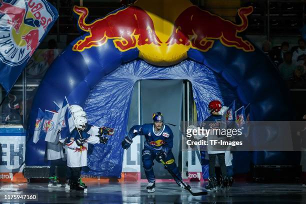 Blake Parlett of EHC Red Bull Muenchen come in during the match between EHC Red Bull Muenchen and Iserlohn Roosters at Olympiaeishalle Muenchen on...