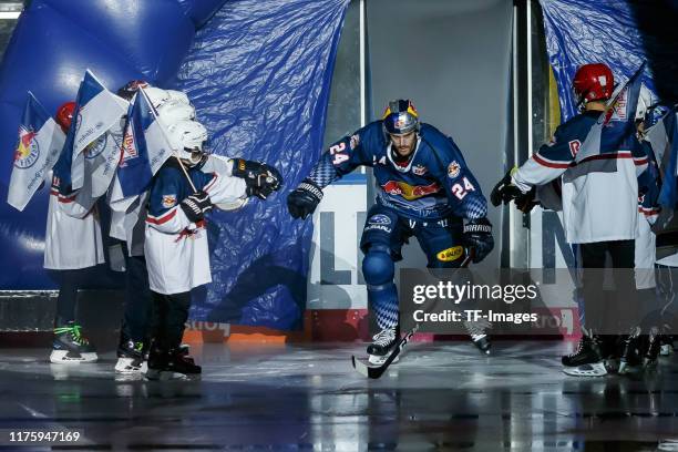 Robert Sanguinetti of EHC Red Bull Muenchen come in during the match between EHC Red Bull Muenchen and Iserlohn Roosters at Olympiaeishalle Muenchen...