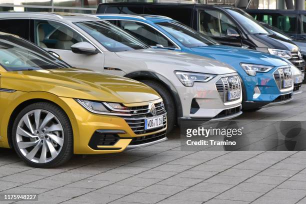 colorful cars on the street - volkswagen stock pictures, royalty-free photos & images