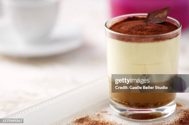 tiramisu in glass with chocolate garnish - ティラミス　ガラス ストックフォトと画像