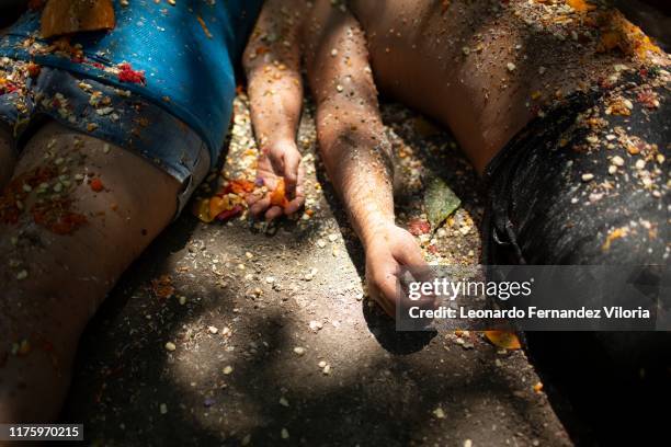 People participates in a prosperity ritual called "Velación" during a meeting of people following the cult of María Lionza on the mountain of Sorte...