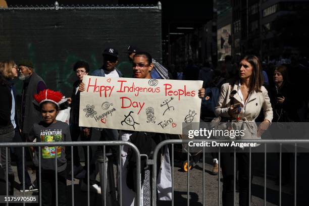 Protestor attends the 75th annual Columbus Day Parade in Midtown Manhattan on October 14, 2019 in New York City. Organized by the Columbus Citizens...