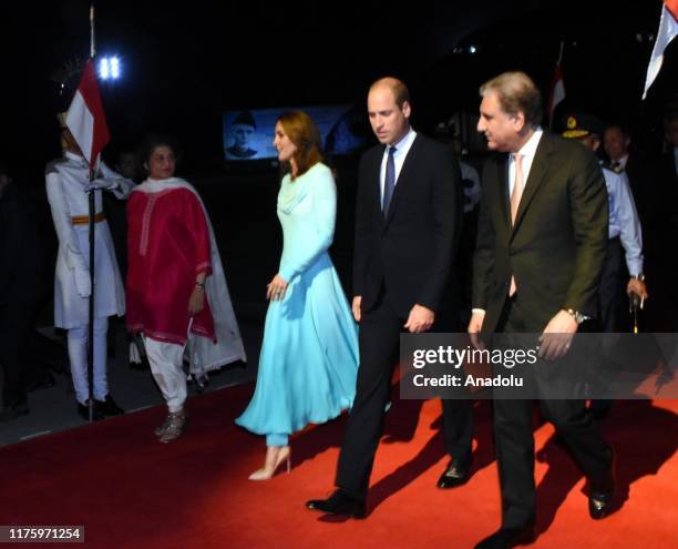 Duke of Cambridge Prince William and his wife Duchess Kate Middleton are welcomed by Pakistani Foreign Minister Shah Mehmood Qureshi at Nur Khan...