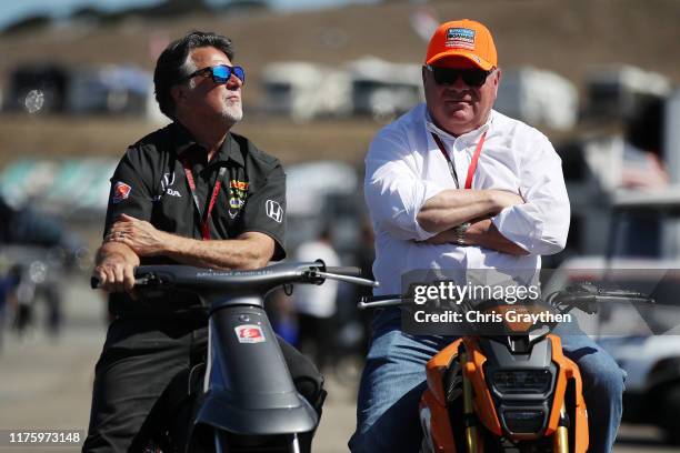 Michael Andretti and Chip Ganassi talk during practice for the NTT IndyCar Series Firestone Grand Prix of Monterey at WeatherTech Raceway Laguna Seca...