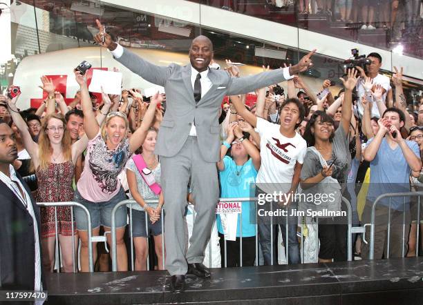 Actor Tyrese Gibson with fans attends the "Transformers: Dark Of The Moon" premiere in Times Square on June 28, 2011 in New York City.
