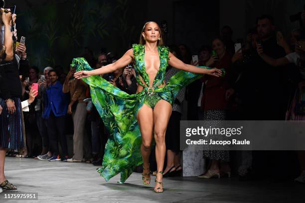 Jennifer Lopez walks the runway at the Versace show during the Milan Fashion Week Spring/Summer 2020 on September 20, 2019 in Milan, Italy. She is...