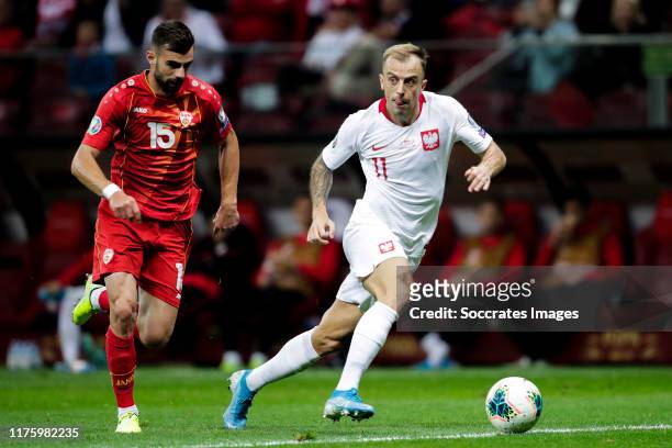 Egzon Bejtulai of North Macedonia, Kamil Grosicki of Poland during the EURO Qualifier match between Poland v FYR Macedonia at the Stadion Narodowy on...
