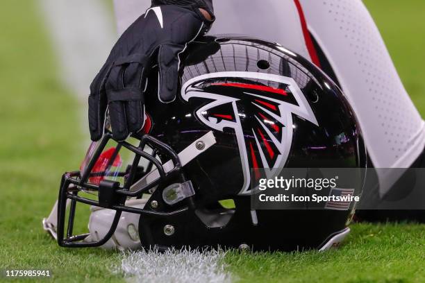 An Atlanta Falcons helmet on the field before the NFL football game between the Atlanta Falcons and the Arizona Cardinals on October 13, 2019 at...