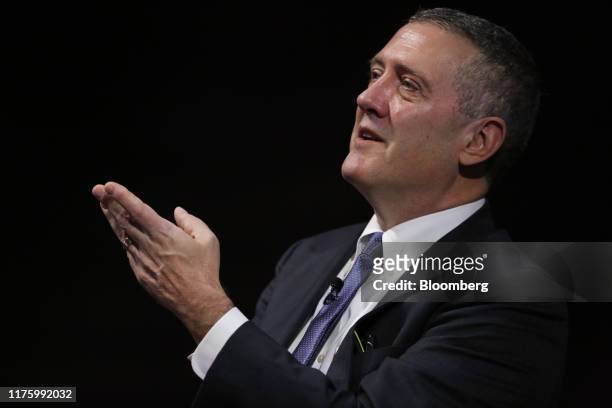 James Bullard, president and chief executive officer of the Federal Reserve Bank of St. Louis, gestures while speaking at the 2019 Monetary and...