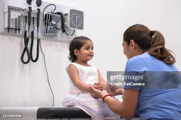 visit to the paediatrician - emergency medicine stock pictures, royalty-free photos & images