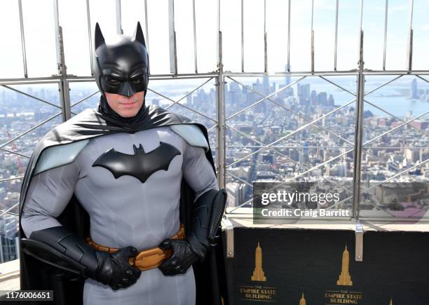 Batman celebrated his 80th birthday by visiting Gotham’s most iconic sky scraper, the Empire State Building with Dan DiDio, Executive Vice President...