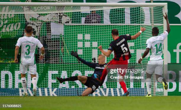 Maximilian Wittek of SpVgg Greuther Fuerth , goalkeeper Sascha Burchert of SpVgg Greuther Fuerth , Benedikt Roecker of SV Wehen Wiesbaden and...