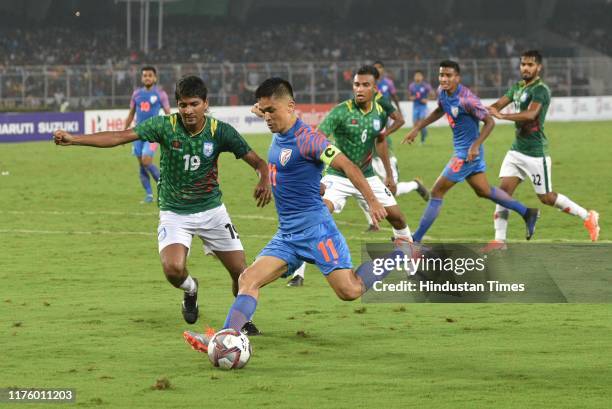 Indian captain Sunil Chhetri in action against Bangladesh during the
