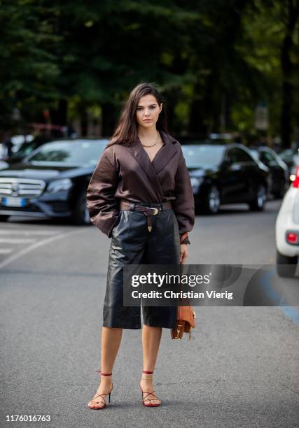 Doina Ciobanu is seen wearing black leather pants, brown blazer outside the Tod’s show during Milan Fashion Week Spring/Summer 2020 on September 20,...