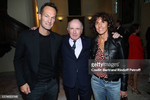 Francois Pinault standing between General Manager of Yves Saint Laurent, Francesca Bellettini and Gregory Boutte attend the Kering Heritage Days...