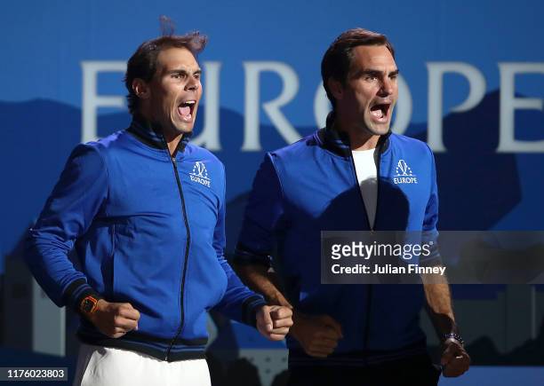 Rafael Nadal of Team Europe and teammate Roger Federer celebrate during the singles match between Stefanos Tsitsipas of Team Europe and Taylor Fritz...