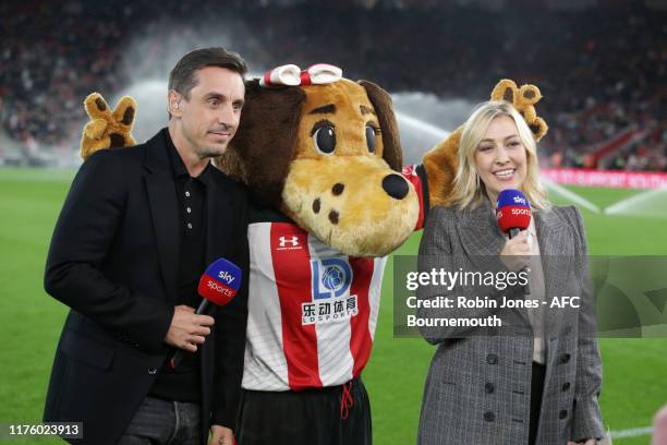 Gary Neville and Kelly Cates of Sky with Southampton mascot before the Premier League match between Southampton FC and AFC Bournemouth at St Mary's...