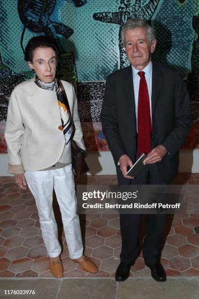 Alain Minc and his wife Sophie Boisrond attend the Kering Heritage Days opening night at Kering and Balenciaga Company Headquarter on September 20,...