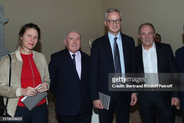 Francois Pinault , his son CEO of Kering Group, Francois-Henri Pinault , Politician Bruno Le Maire and his wife Pauline Doussau de Bazignan attend...