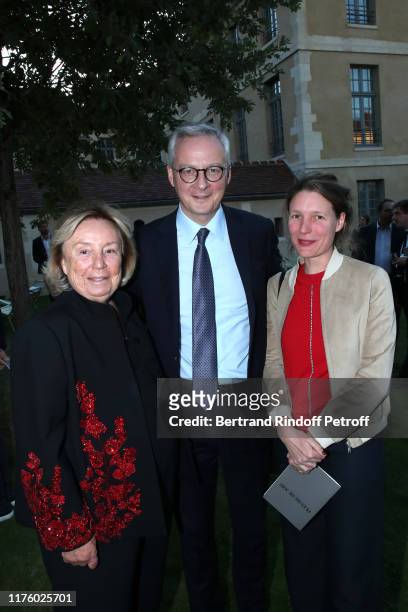 Maryvonne Pinault, Politician Bruno Le Maire and his wife Pauline Doussau de Bazignan attend the Kering Heritage Days opening night at Kering and...