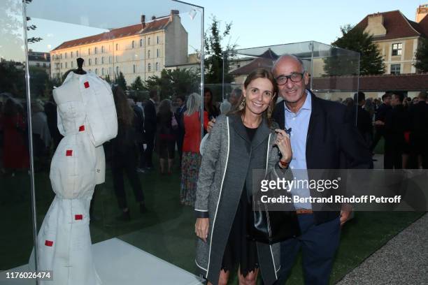 Clemence Krzentowski and her husband Didier Krzentowski attend the Kering Heritage Days opening night at Kering and Balenciaga Company Headquarter on...